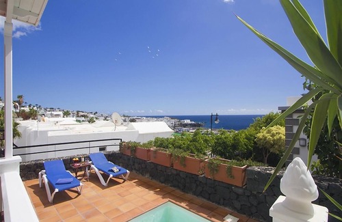 Puerto del Carmen Villa | Vacation Villa 'Benedicte' with Sea View, Wi-Fi and Air Conditioning