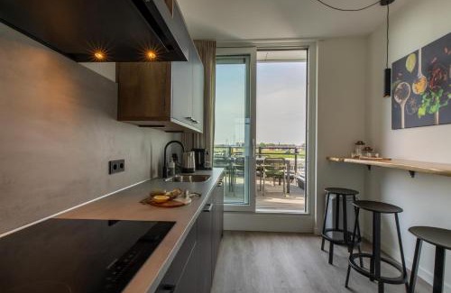 Sint-Annaland Apartment | Vakantiewoning aan het water 'Oester Oase' - met 2 balkons - Vista Maris - Nr 36