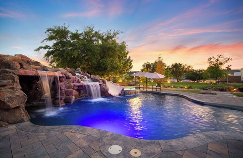 Enterprise House | Vegas Farmhouse Retreat: Waterfall Pool/Spa, Campfire, Sports Court & RV Access