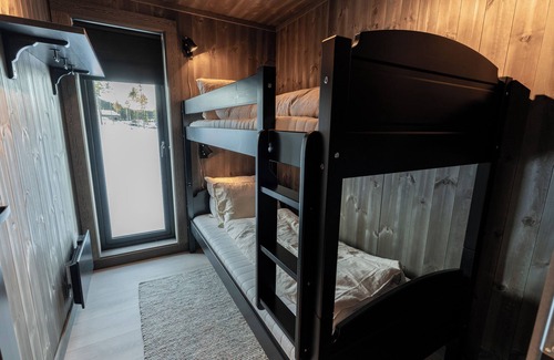 Nes Cabin | Velkommen til Kveldsro – en familievennlig hytte i hjertet av Nesfjellet.