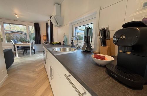 Bosgebied Hoenderloo Ski Chalet | Veluwe Holidays - Private Chalet with Big Garden and Community Swimming Pool