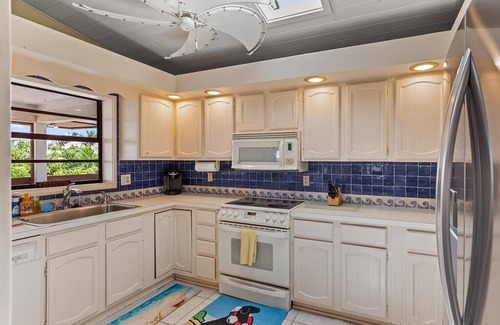Venetian Shores House | Venetian Shores Retreat with Boat Lift, Tiki Hut & Hot Tub