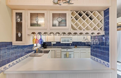 Venetian Shores House | Venetian Shores Retreat with Boat Lift, Tiki Hut & Hot Tub