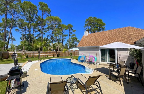 Myrtle Grove House | Very Private Home w/HEATED Pool, Palm Trees and Big Fenced Yard.