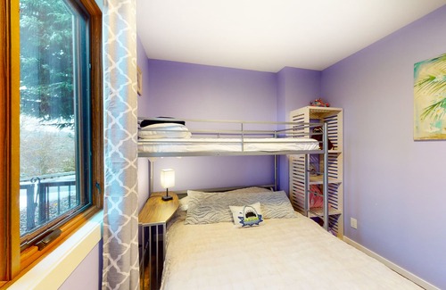 Nehalem House | Vibrant, dog-friendly stay with private hot tub, washer/dryer & fireplace