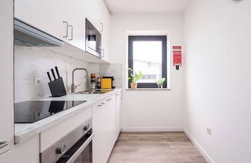 Sao Mamede de Infesta Apartment | Vibrant Urban Flat by HostWise