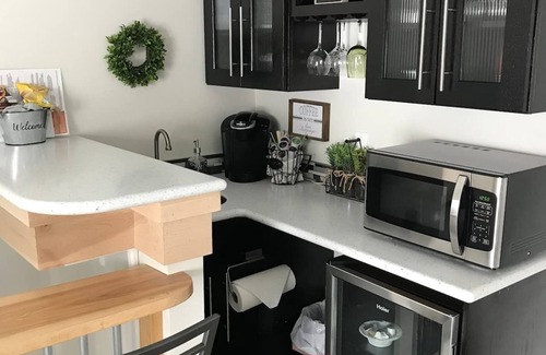 Lake Fenton Apartment | View of Lake Fenton with hot tub and fire place