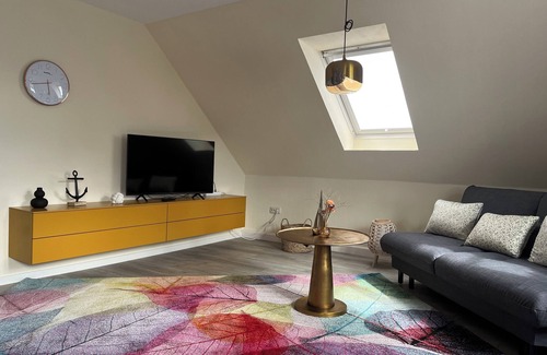 Butjadingen Apartment | View of the dike & 50 m from the harbor and the North Sea
