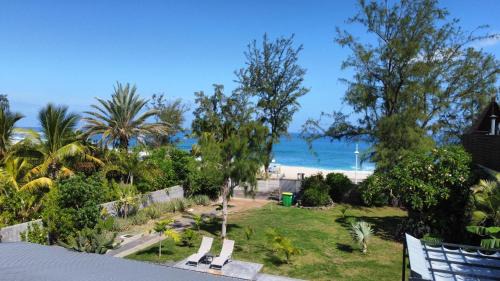 Boucan Canot Villa | VILLA Ô 3 CAP - Magnifique Villa - classée 4 étoiles - Piscine CHAUFFEE - 4 ch - 8 personnes - accès direct à la plage et à l'esplanade de BOUCAN CANOT