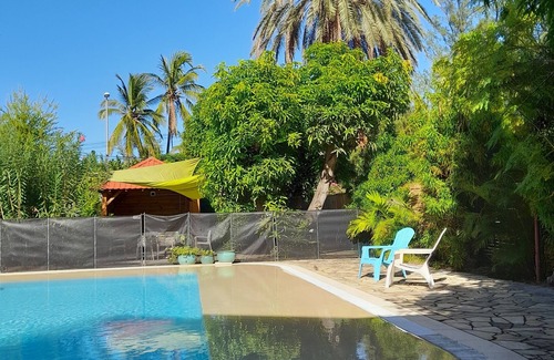 La Saline Les Bains Villa | Villa Anthalo and its large heated swimming pool, 2 steps from the lagoon