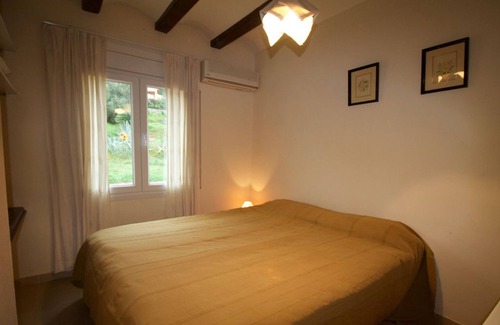Pau Villa | Villa Bella beautifully situated with an olive grove overlooking the beach and sea
