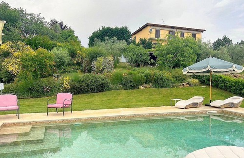San Gimignano Apartment | Villa Bruma: A welcoming two-story apartment that is part of a villa surrounded by meadows and by green hills, with Free WI-FI.