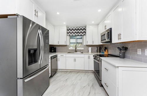 Punta Gorda Apartment | Villa Capri | Waterfront Luxury Retreat Heated Saltwater Pool Dock