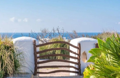 Ciutadella de Menorca Villa | Villa Carina - family villa with heated pool and sea view