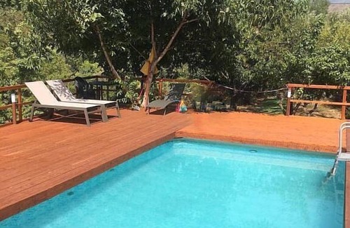Viagrande House | Villa Carlina B: A graceful apartment surrounded by the greenery.