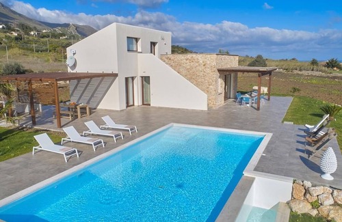 Scopello Villa | VILLA DELLA PIGNA with 4 rooms with a semi infinity pool and sea view in Scopello.