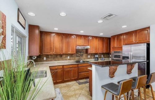 Mariner House | Villa Enzo 5BRs, 2.5 BAs, sleeps 20+, 43 feet long heated pool, over 3,100 sqft.