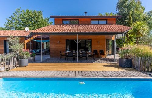 Biscarrosse Villa | Villa familiale 10 pers. à Biscarrosse avec piscine chauffée, près du lac et des pistes cyclables - FR-1-319-488