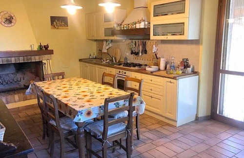 Todi Villa | Villa Gramigna: A charming two-story villa surrounded by the greenery.