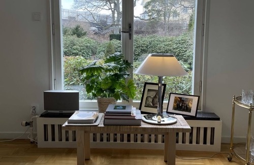 Saltsjobaden House | Villa idyll on Solsidan with award-winning park-like garden and lake views!