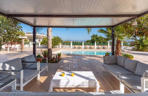 Alhaurin de la Torre Villa | 'Villa Isabella' with Mountain Views, Wi-Fi and Air Conditioning