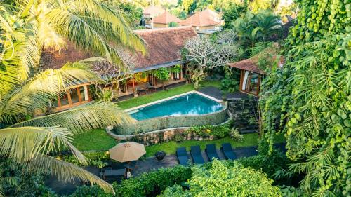 Kutuh Kaja Villa | Villa Kayu Ubud by OriVista