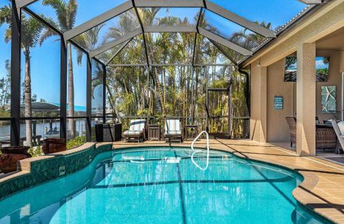 Burnt Store House | Villa Neptune's Grotto- BRAND NEW with heated Pool, Hot Tub, and dock with Tiki