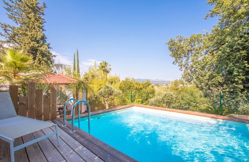 Cuers Villa | Villa 'Palmiers En Couleurs' with Mountain View, Private Pool and Wi-Fi