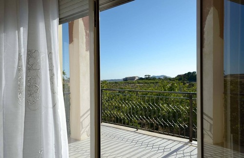 Racalmuto Villa | Villa Paola - Pool surrounded by greenery