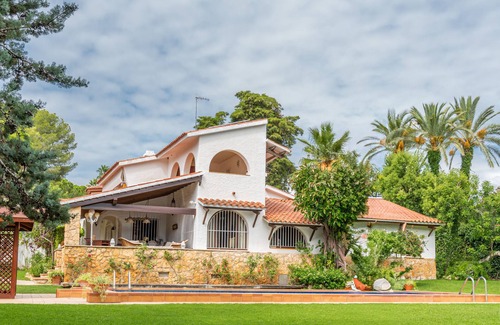 El Roc de Sant Gaieta Villa | Villa Roses R212 with large garden and private pool 600 meters from the beach