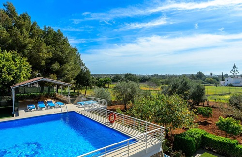 Santa Eulalia del Rio Villa | Villa "S'hort des Baladres Ibiza" with Sea View, Pool & Wi-Fi