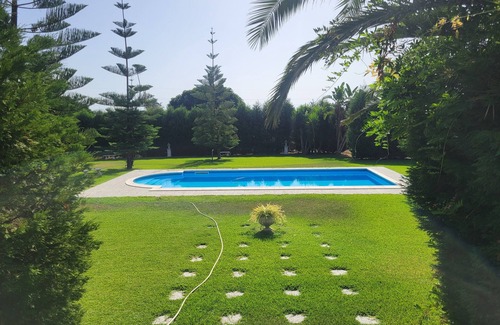 Santa Venerina Villa | Villa surrounded by greenery with swimming pool, Zagara suite