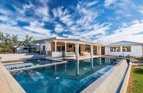 Talana Villa | Villa with heated swimming pool surrounded by greenery