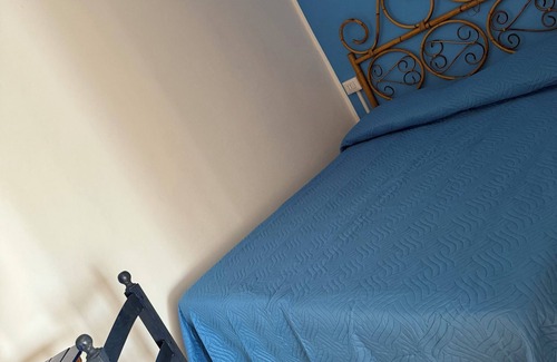 Stromboli Villa | Villa with patio surrounded by greenery, equipped kitchen on the patio. Close to the sea