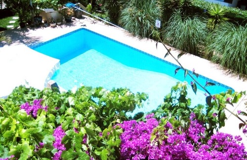 Porches House | Villa with pool in an exotic garden, just a few minutes' drive to the beach