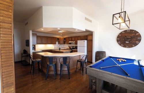 Charlevoix Condo | Villager Loft | Pool Table & Dining Discounts