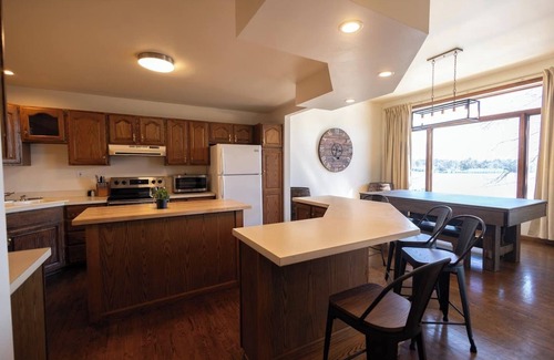 Charlevoix Condo | Villager Loft | Pool Table & Dining Discounts