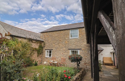 Bridport Cottage | VINE COTTAGE, pet friendly, with a garden in Burton Bradstock