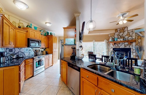 Eureka Springs House | Vintage 2-story lakefront home with fireplace, pellet smoker, firepit & decks