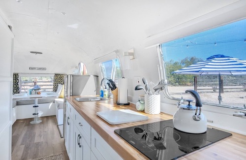 Catalina House | Vintage Airstream near the Catalina Mountains by RedAwning
