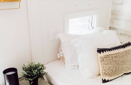 Gnaw Bone RV Rental | Vintage wood camper in Brown County