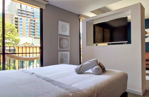 Centro International Apartment | w*| Sophisticated 1BR in Luxury Building