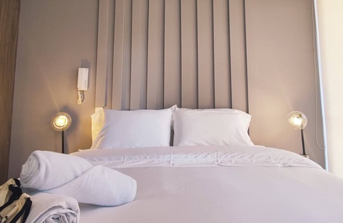 Centro International Apartment | w*| Sophisticated 1BR in Luxury Building