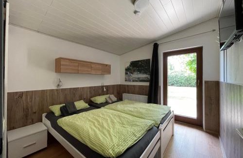 Haddorfer Seen House | Wacholderbusch - Lastering Ferienhäuser & Apartments