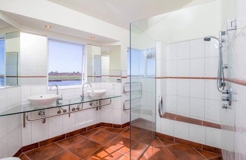 Waipu House | Waipu RiverView Retreat for the beach, cafes, golf, surf, hikes, steps to water