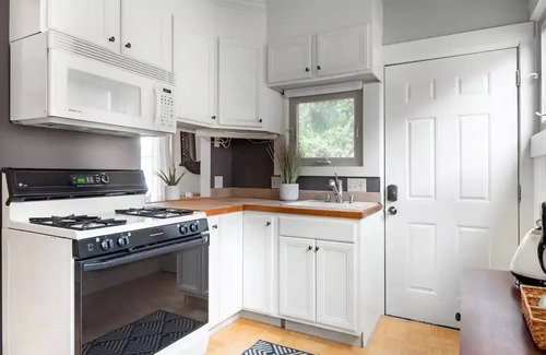 Mississippi District Condo | Walk Everywhere from a Bright, Historic Home with Patio