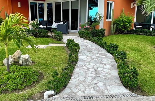 Bajos de Chila Condo | Walk out to pool and ocean steps away.