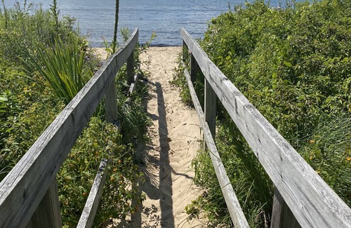 Acme Condo | Walk out your slider onto the beach!