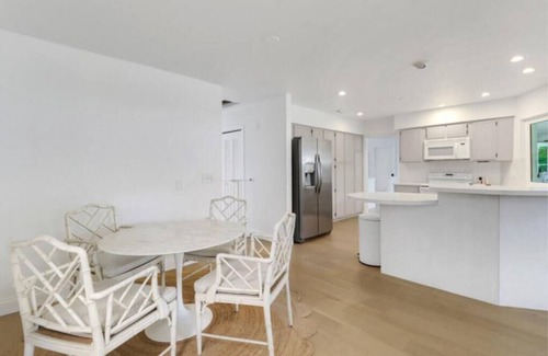Moorings House | Walk to beach from home in The Moorings . Private heated pool & Pet-friendly.n
