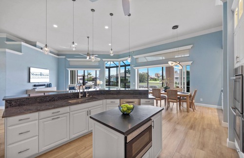 Marco Island House | Walk to beach waterfront home w/pool, spa & kayaks